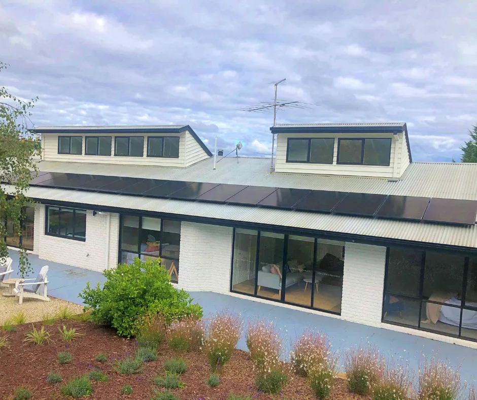 Black solar panels on a white brick home in Kyneton, installed by Midland Solar